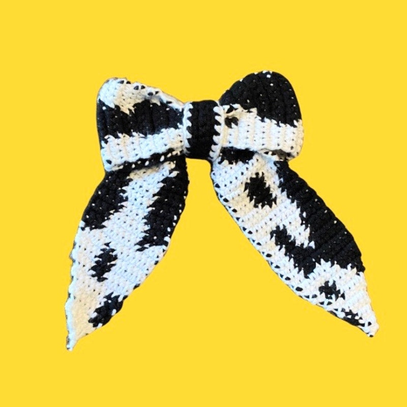 Black & White Cowprint Crochet Bow - Handmade Accessory with Removable Clip