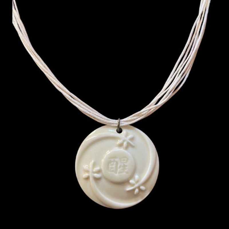 Cream Ceramic Avon “Haiku Awakenings” Pendant Necklace