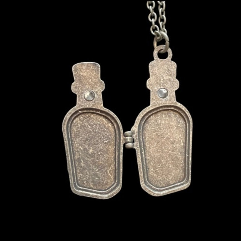 Disney’s Alice in Wonderland Pewter Toned Drink Me Potion Bottle Magnetic Locket Pendant Necklace