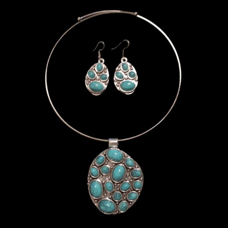 Southwestern Style Mock Turquoise Studded Silver Toned Abstract Oval Pendant Necklace and Earring Set